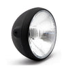 British style 7" H4 headlamp. Side mount. Black -