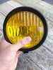 Koplamp zwart met gele lens 5.5 inch